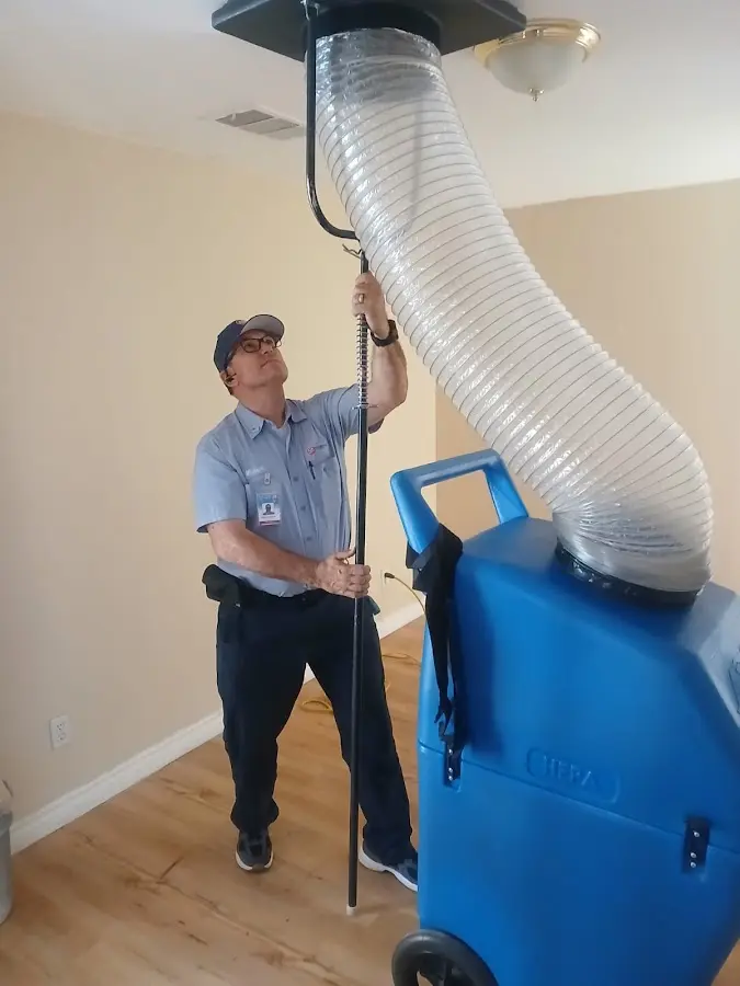 HVAC Installation technician using HEPA equipment in Bithlo